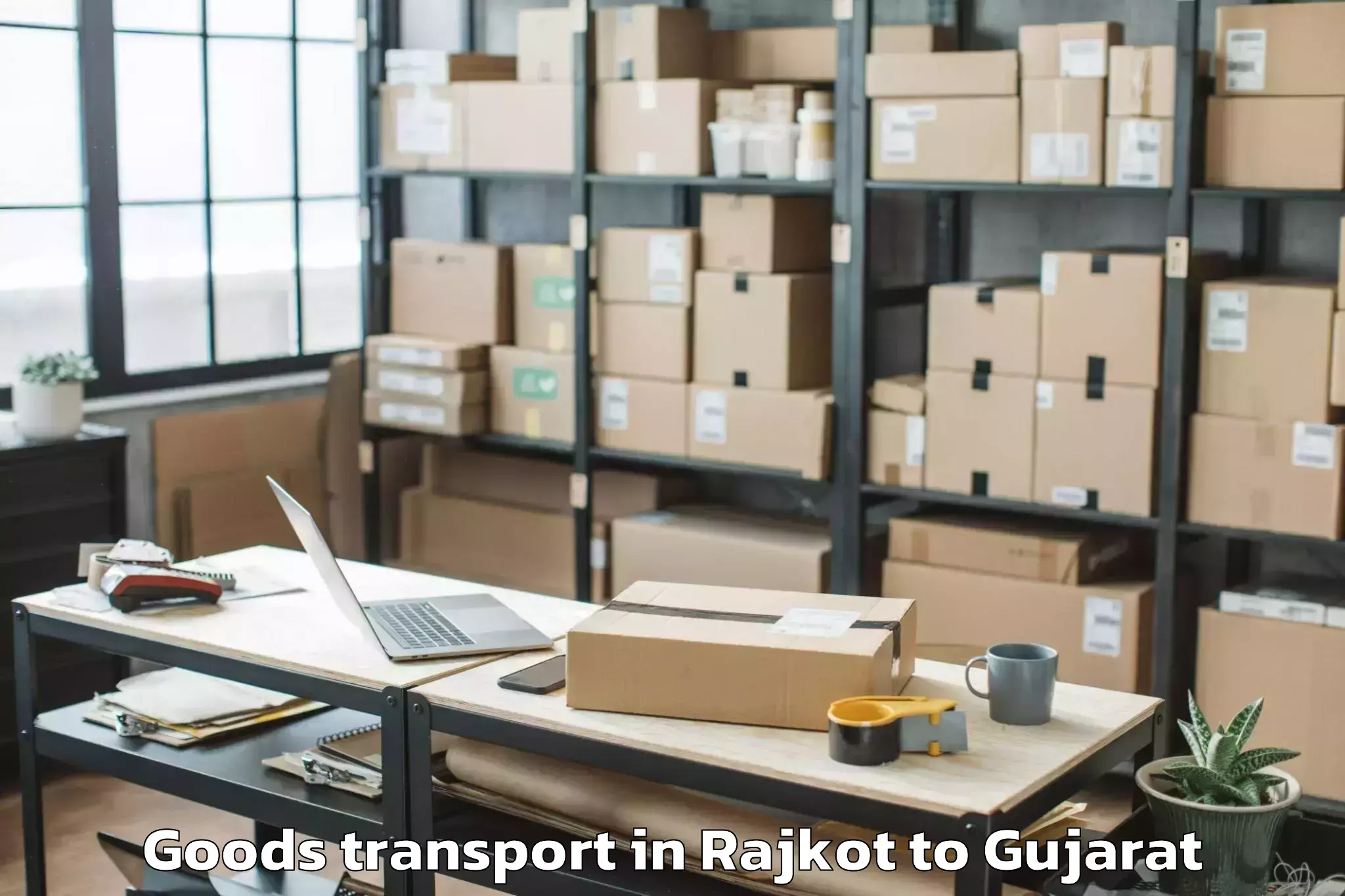 Top Rajkot to Navsari Agricultural Universit Goods Transport Available